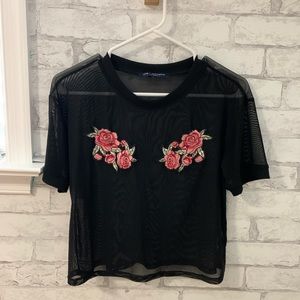 Sheer black top with flowers on chest. 🖤💕